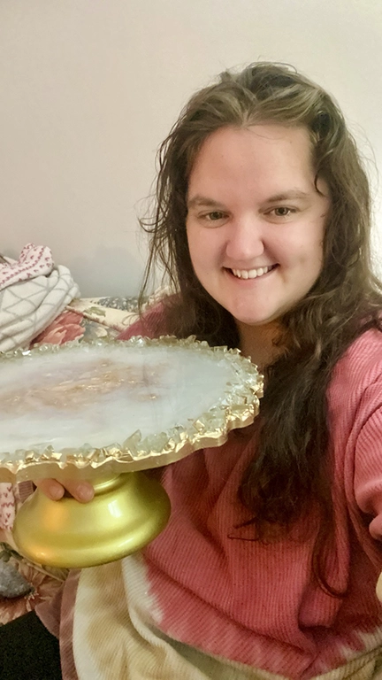 Sadie Josephine Beiler decorating a cake
